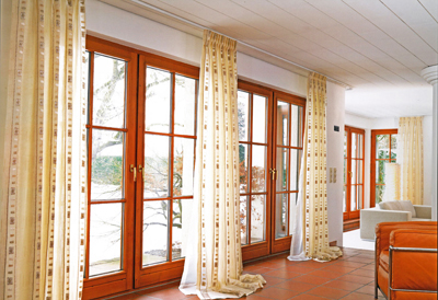 interior-brown-stained-wooden-large-glass-window-using-cream-flower-pattern-curtain-on-stainless-steel-rod-curtain-ideas-for-large-windows